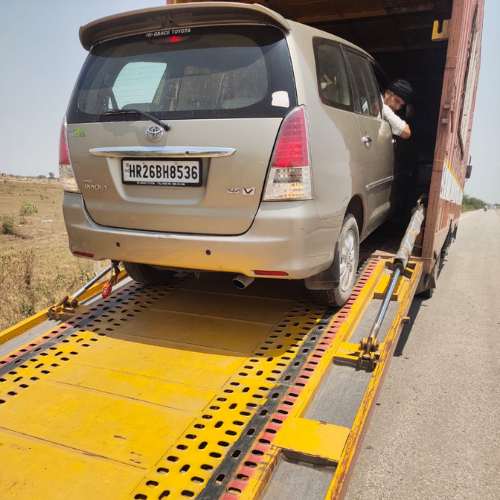 Hatchback Car Delivery by Om Logistic